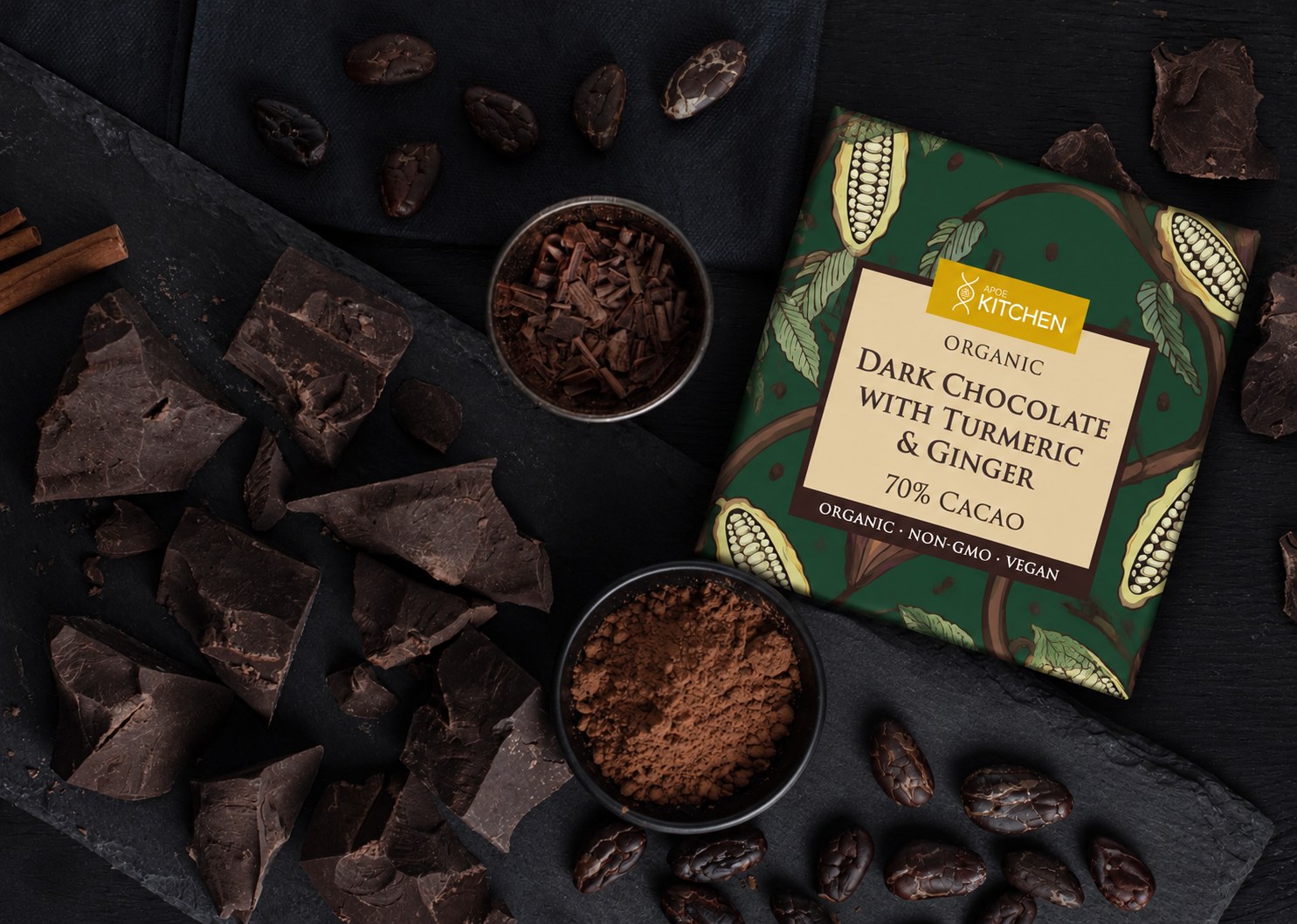 APOE Kitchen Organic Dark Chocolate with Turmeric and Ginger bar with cacao beans, cocoa powder and chocolate pieces