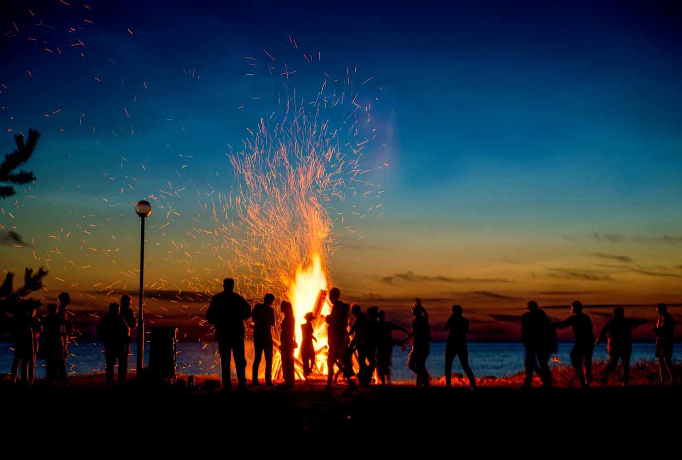 People around bonfire